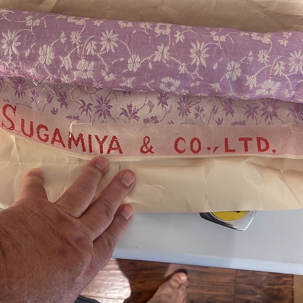 Vintage bolt Japanese brocade. Like new. And 26 1/2 inches wide by 13 feet long.